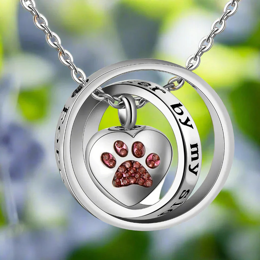 Necklace with stainless steel paw-shaped urn