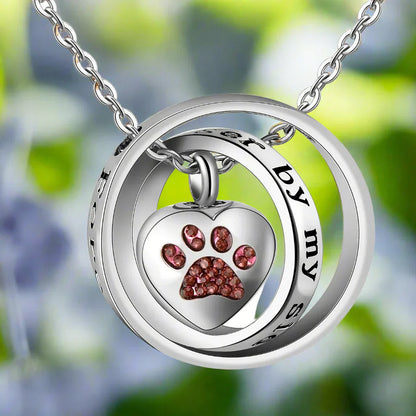 Necklace with stainless steel paw-shaped urn