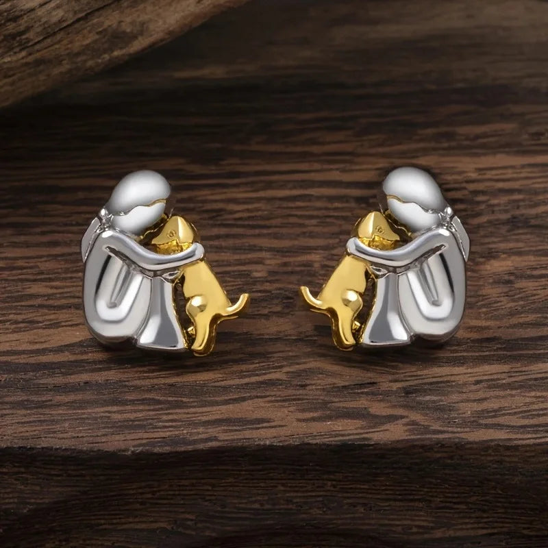 Hug Earrings in Silver and Gold